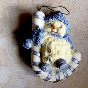 Buddy the Snowman with candy cane Xmas ornament